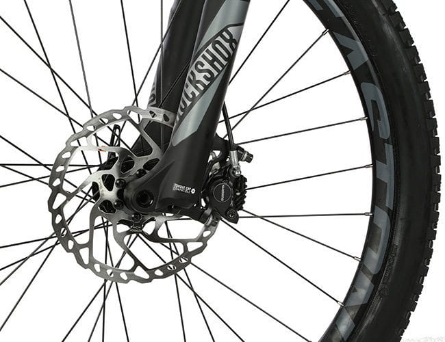 close up bike rim zoom metal shiny tire product photo